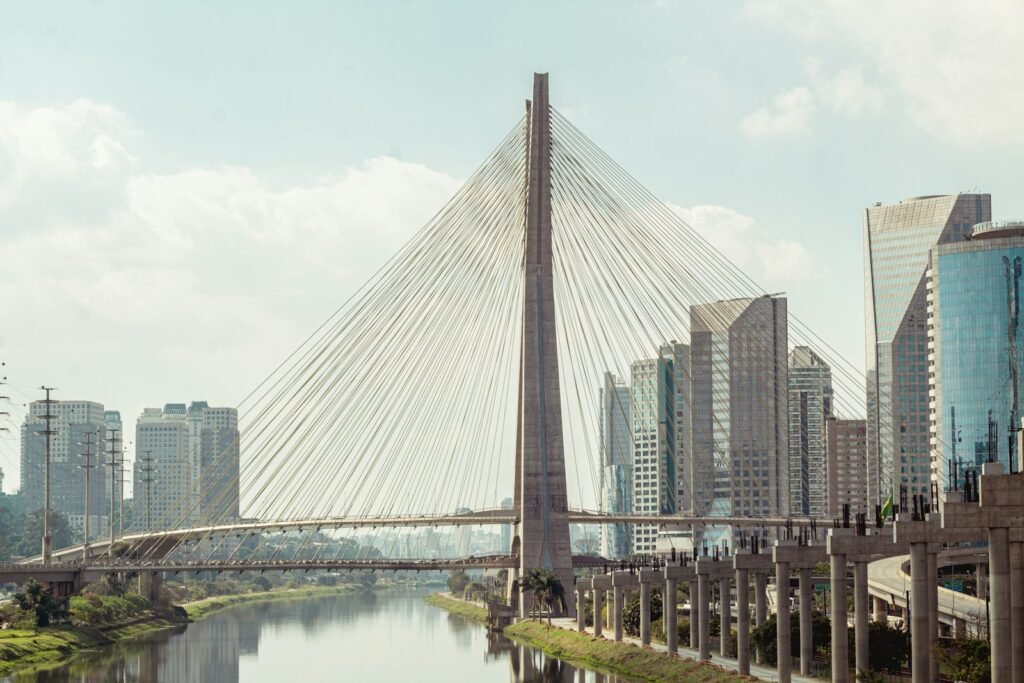 gray concrete bridge over river - Brasil